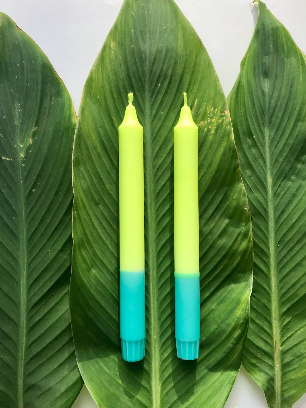 2 candles in neon yellow*turquoise