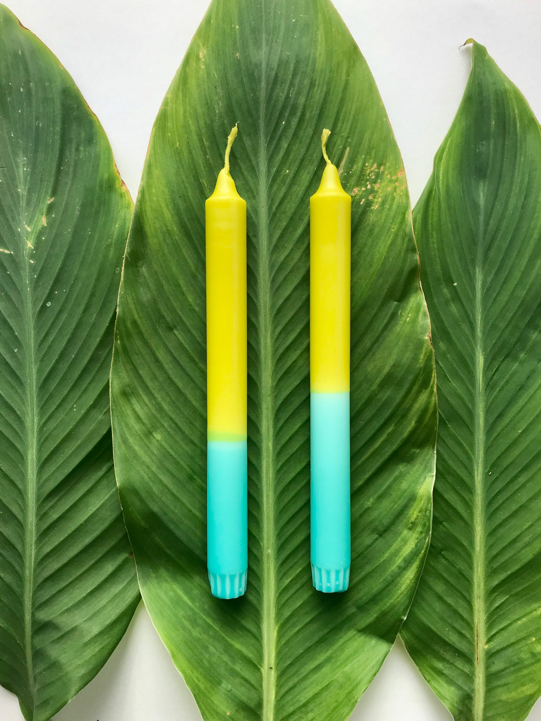 Two candles in green * turquoise 