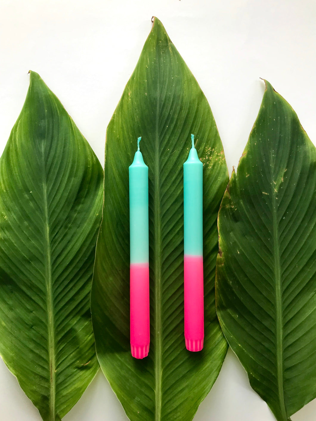 2 candles neon pink*turquoise 