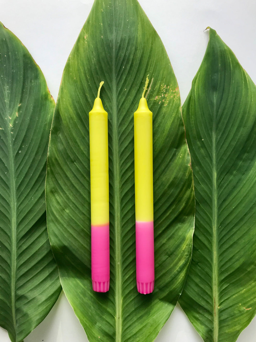 2 candles in green*pink